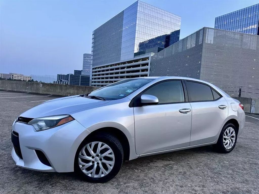 Used 2014 Toyota Corolla LE with VIN 5YFBURHE3EP125203 for sale in Austin, TX