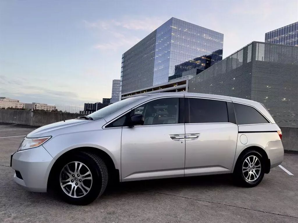 Used 2012 Honda Odyssey EX-L with VIN 5FNRL5H69CB023481 for sale in Austin, TX