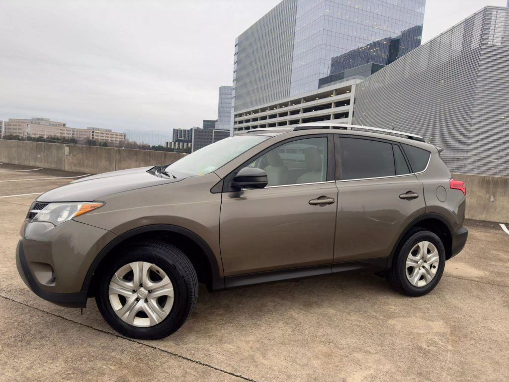 Used 2013 Toyota RAV4 LE with VIN 2T3ZFREV0DW047108 for sale in Austin, TX