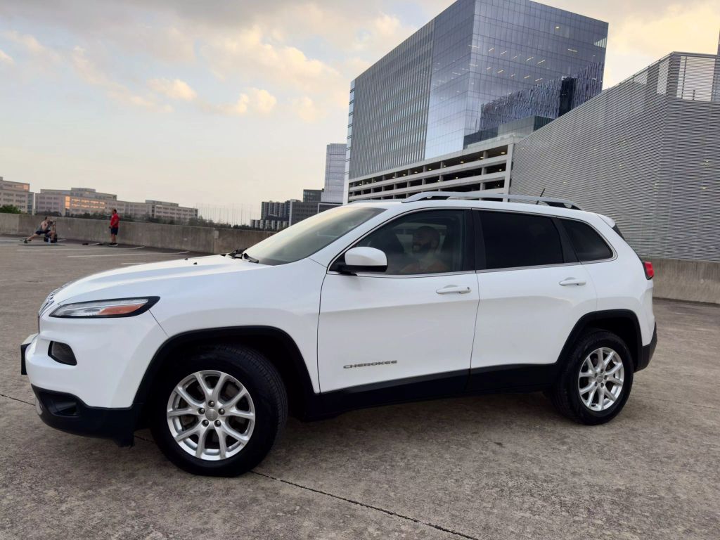 Used 2015 Jeep Cherokee Latitude with VIN 1C4PJLCB4FW711815 for sale in Austin, TX