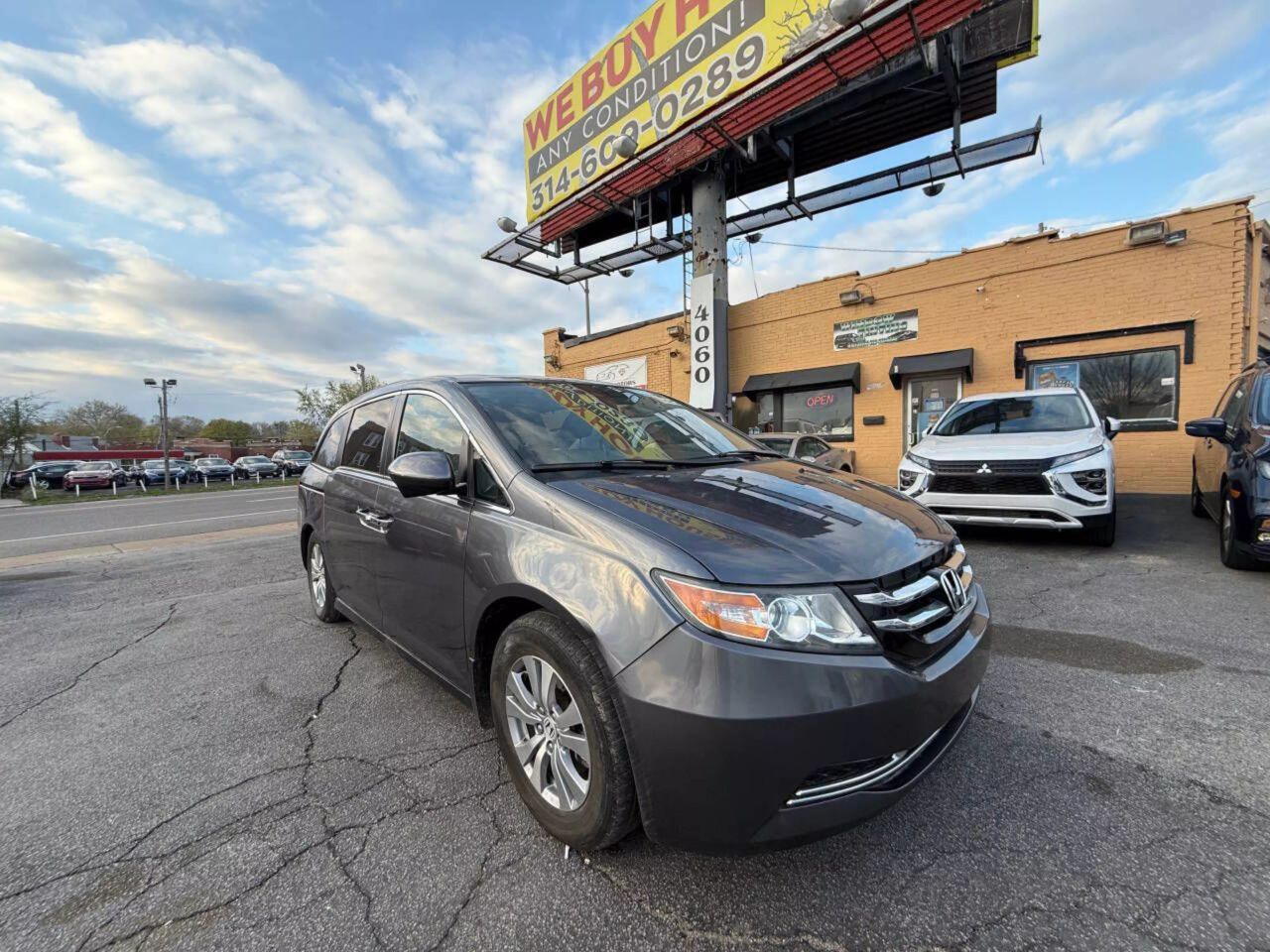Used 2016 Honda Odyssey EX-L with VIN 5FNRL5H62GB111715 for sale in Saint Louis, MO