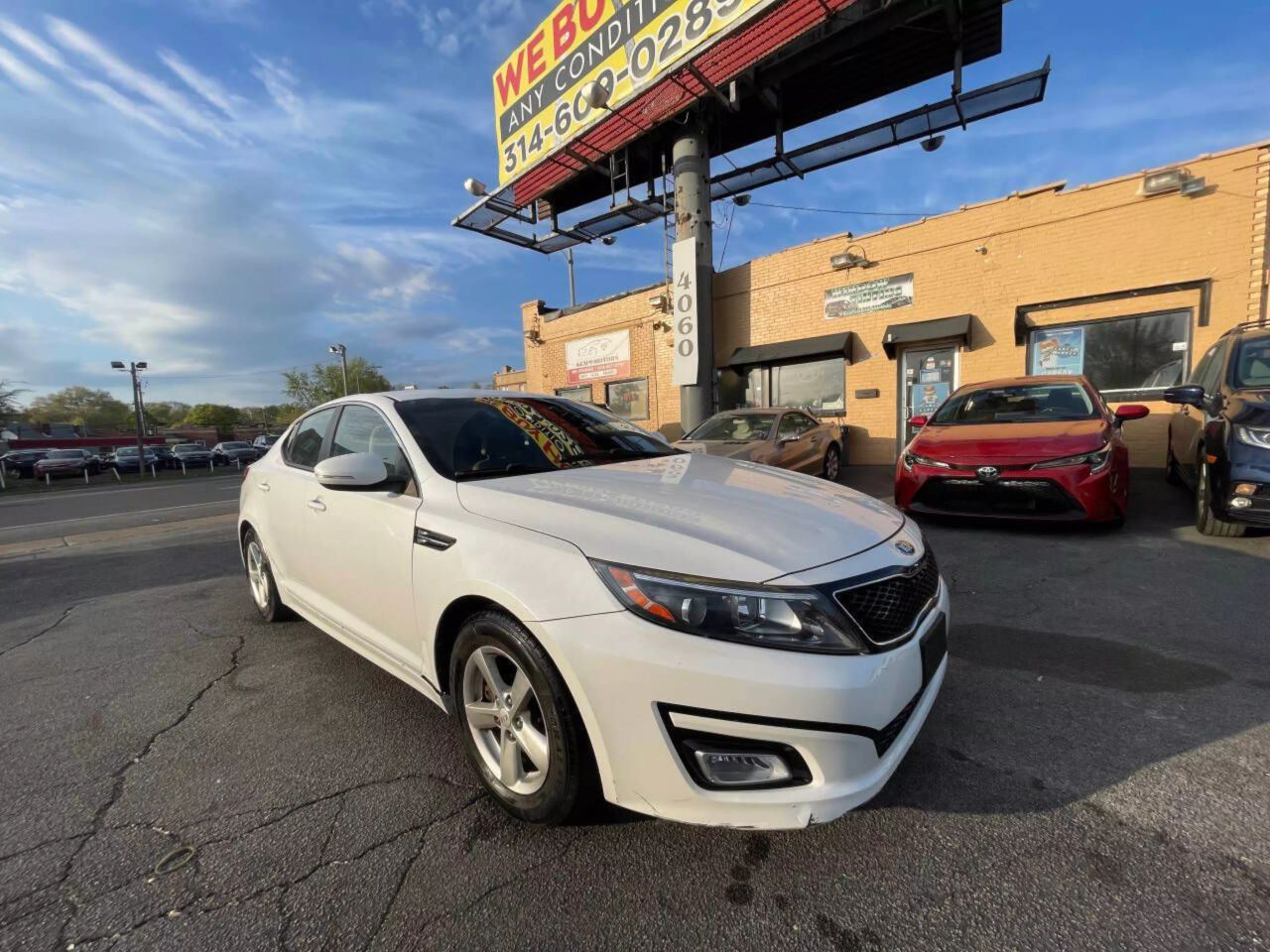 Used 2015 Kia Optima LX with VIN KNAGM4A72F5649121 for sale in Saint Louis, MO