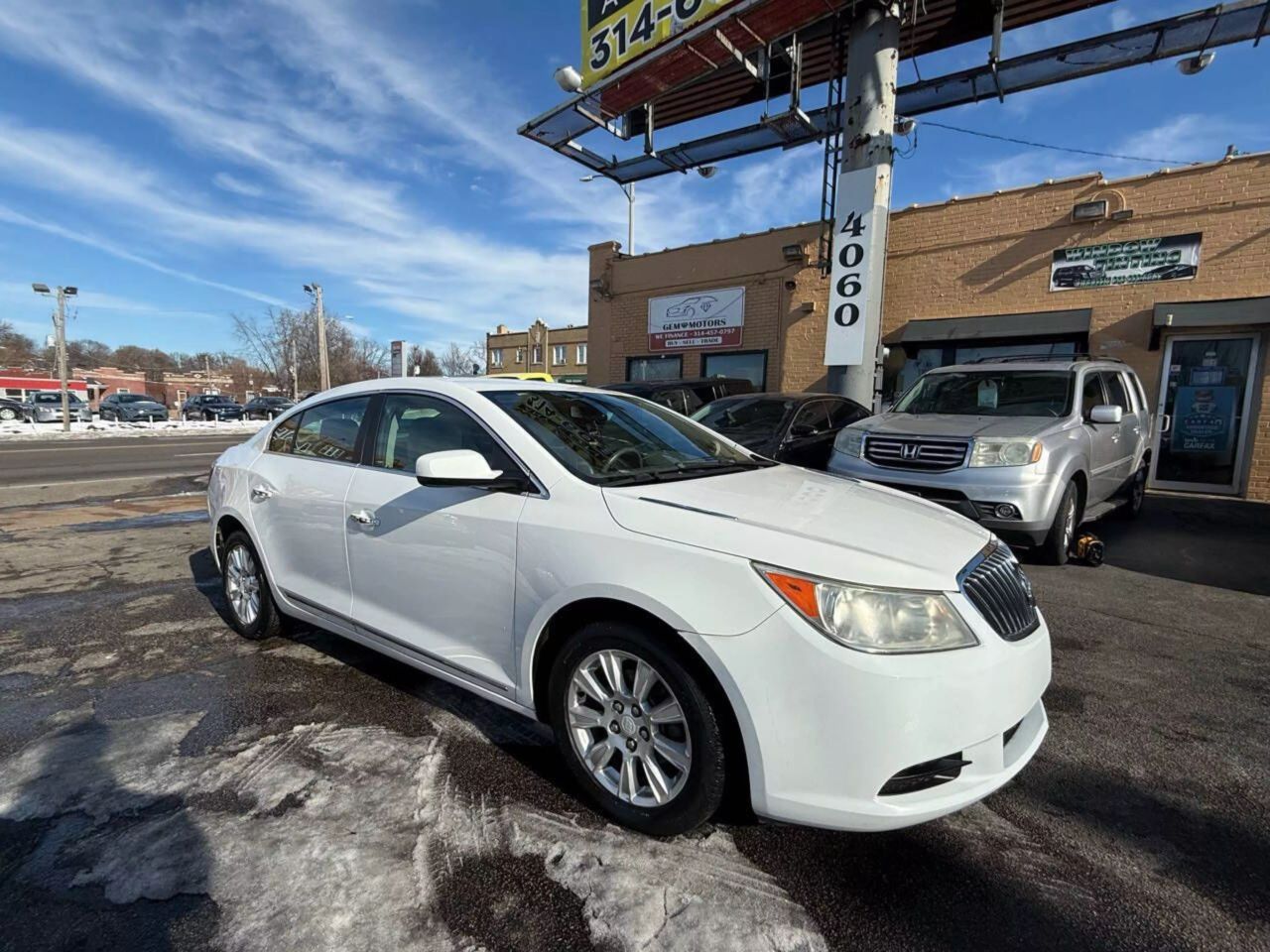 Used 2013 Buick LaCrosse Base with VIN 1G4GA5ER8DF209470 for sale in Saint Louis, MO