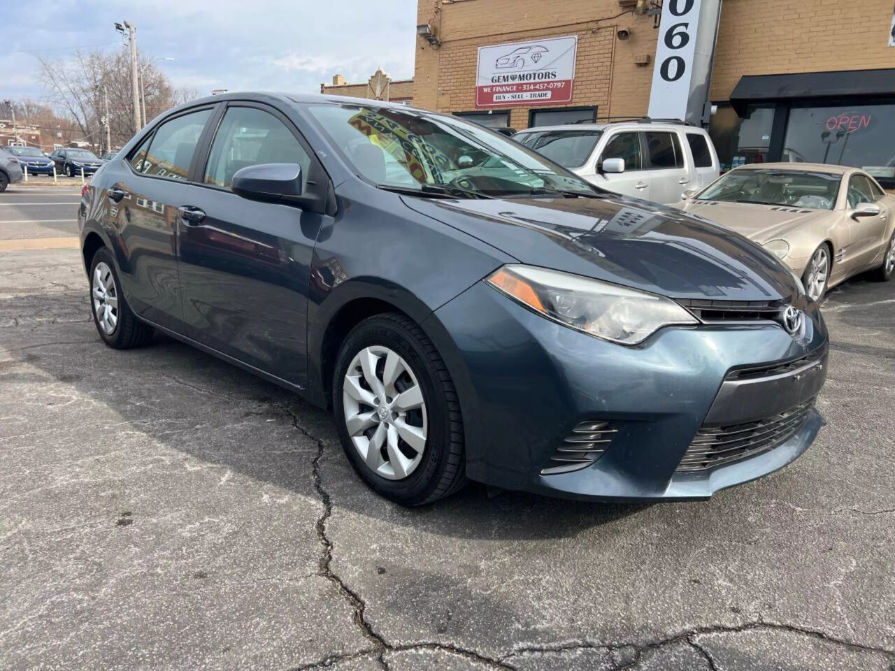 Used 2016 Toyota Corolla LE with VIN 2T1BURHE8GC509013 for sale in Saint Louis, MO