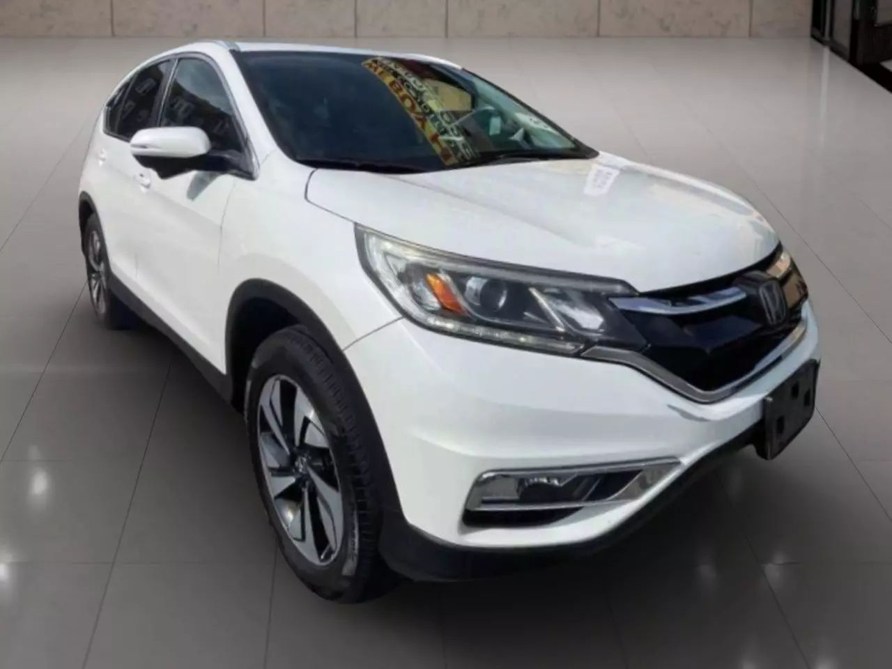 Used 2016 Honda CR-V Touring with VIN 5J6RM4H97GL094001 for sale in Saint Louis, MO