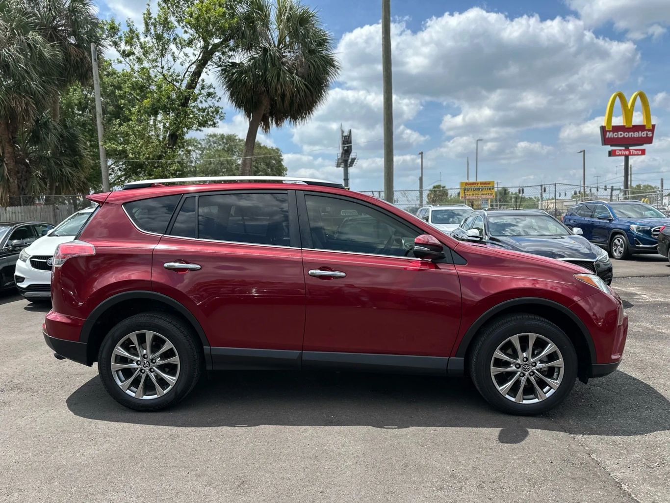 2018 TOYOTA RAV4 SUV 4-CYL, 2.5 LITER LIMITED SPORT UTILITY 4D - Tampa Motor Cars