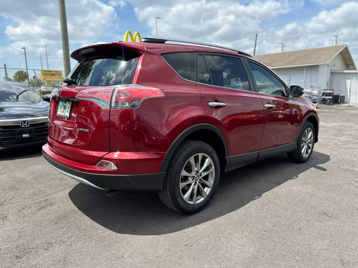 2018 TOYOTA RAV4 SUV 4-CYL, 2.5 LITER LIMITED SPORT UTILITY 4D - Tampa Motor Cars