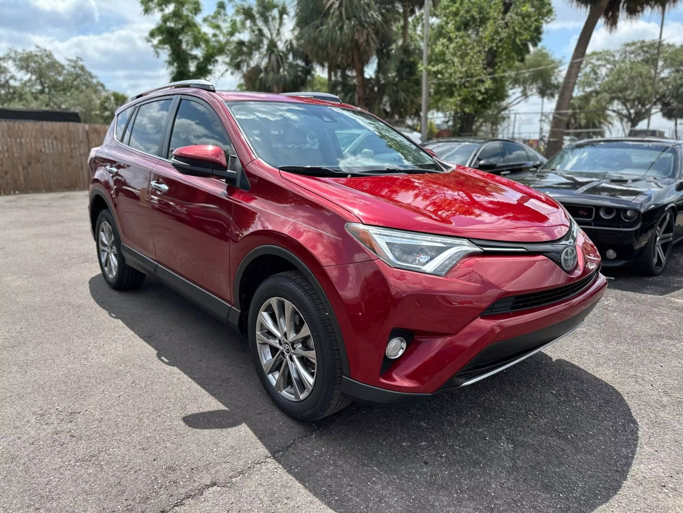 2018 TOYOTA RAV4 SUV 4-CYL, 2.5 LITER LIMITED SPORT UTILITY 4D - Tampa Motor Cars