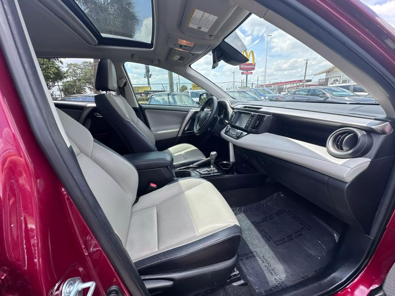 2018 TOYOTA RAV4 SUV 4-CYL, 2.5 LITER LIMITED SPORT UTILITY 4D - Tampa Motor Cars
