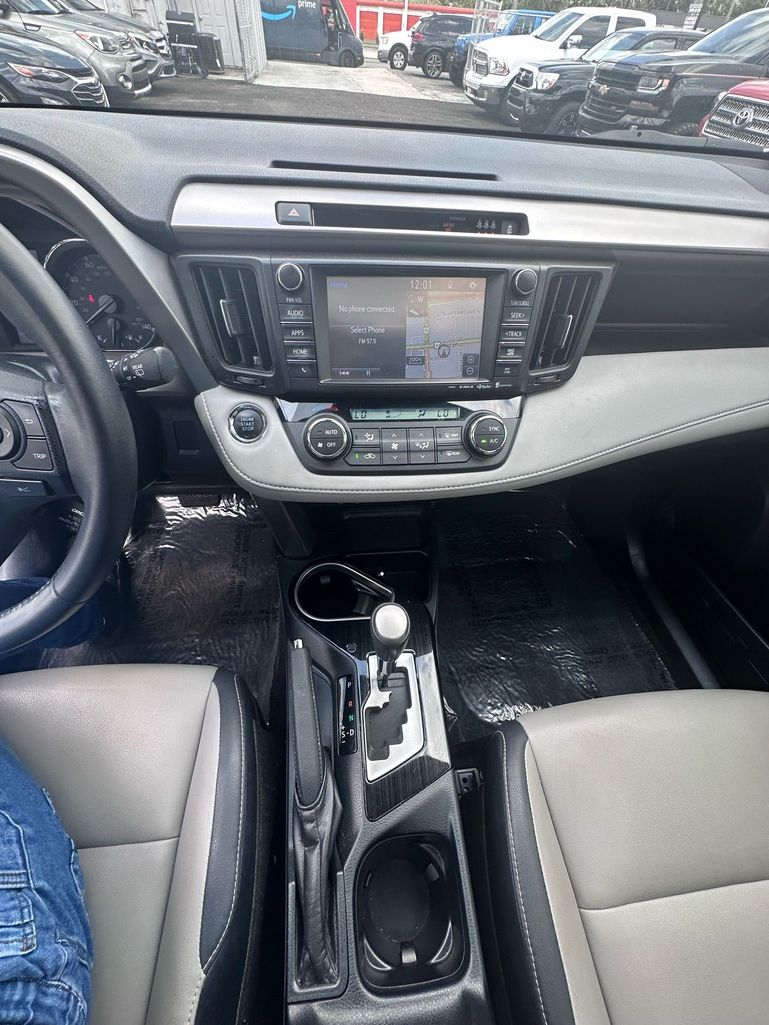 2018 TOYOTA RAV4 SUV 4-CYL, 2.5 LITER LIMITED SPORT UTILITY 4D - Tampa Motor Cars