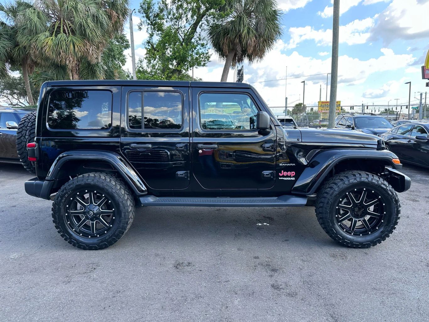 2018 JEEP WRANGLER UNLIMITED SUV 4-CYL, TURBO, 2.0 LITER ALL NEW SAHARA SPORT UTILITY 4D - Tampa Motor Cars