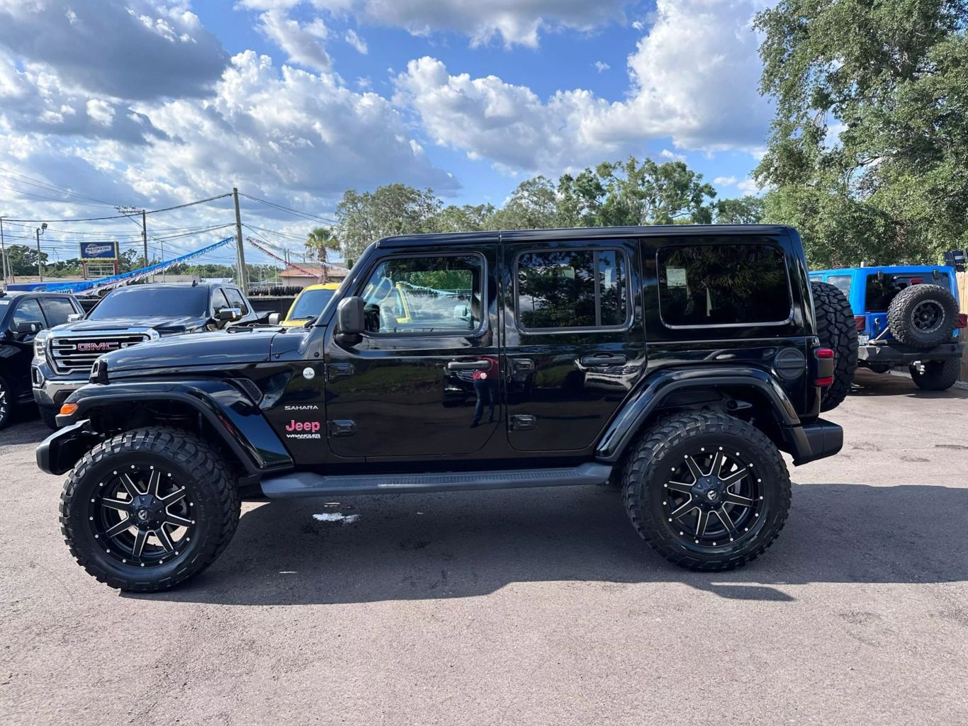 2018 JEEP WRANGLER UNLIMITED SUV 4-CYL, TURBO, 2.0 LITER ALL NEW SAHARA SPORT UTILITY 4D - Tampa Motor Cars