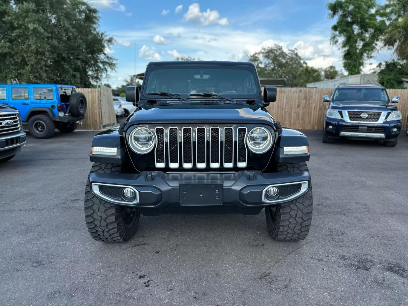 2018 JEEP WRANGLER UNLIMITED SUV 4-CYL, TURBO, 2.0 LITER ALL NEW SAHARA SPORT UTILITY 4D - Tampa Motor Cars