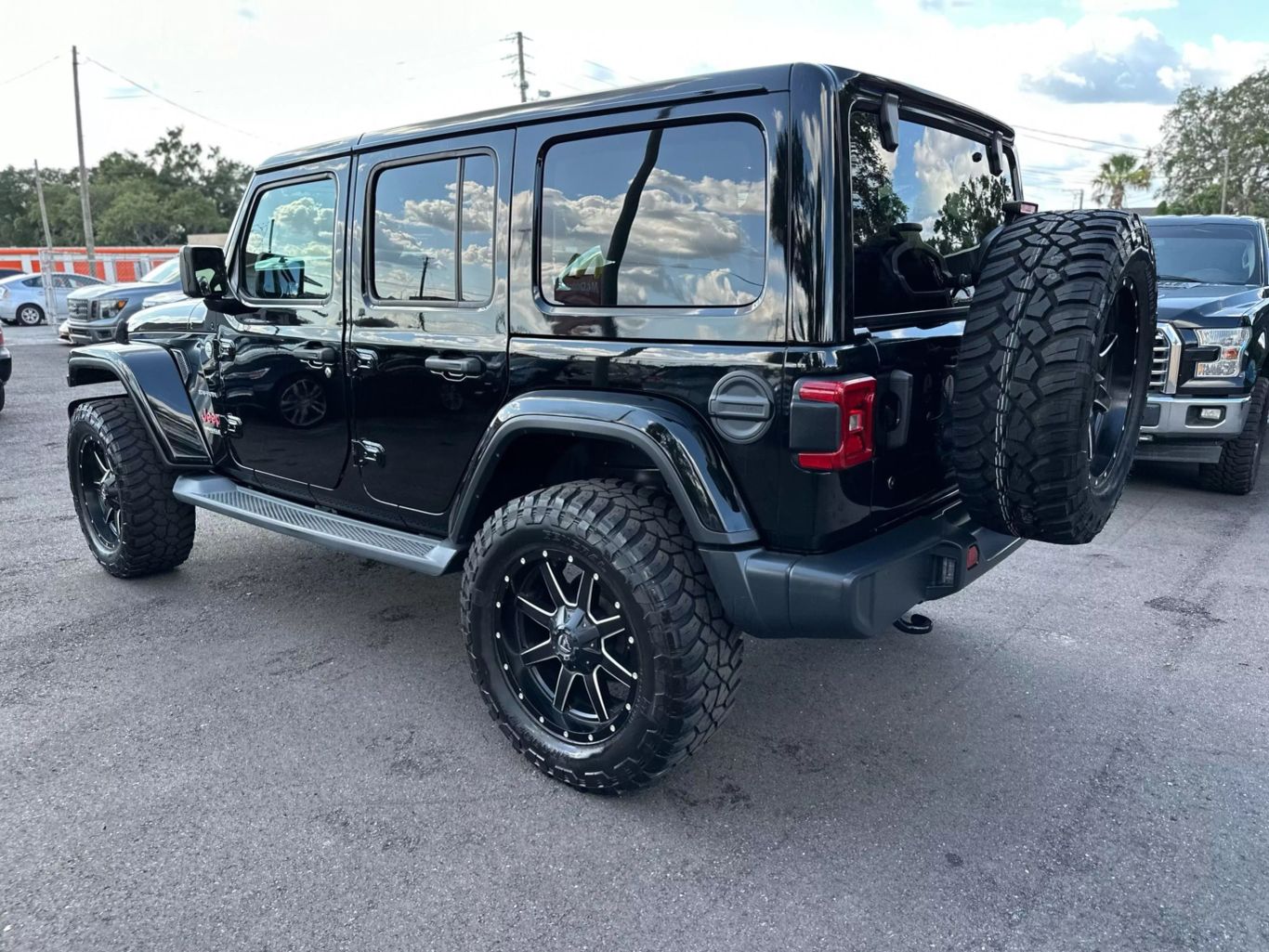 2018 JEEP WRANGLER UNLIMITED SUV 4-CYL, TURBO, 2.0 LITER ALL NEW SAHARA SPORT UTILITY 4D - Tampa Motor Cars