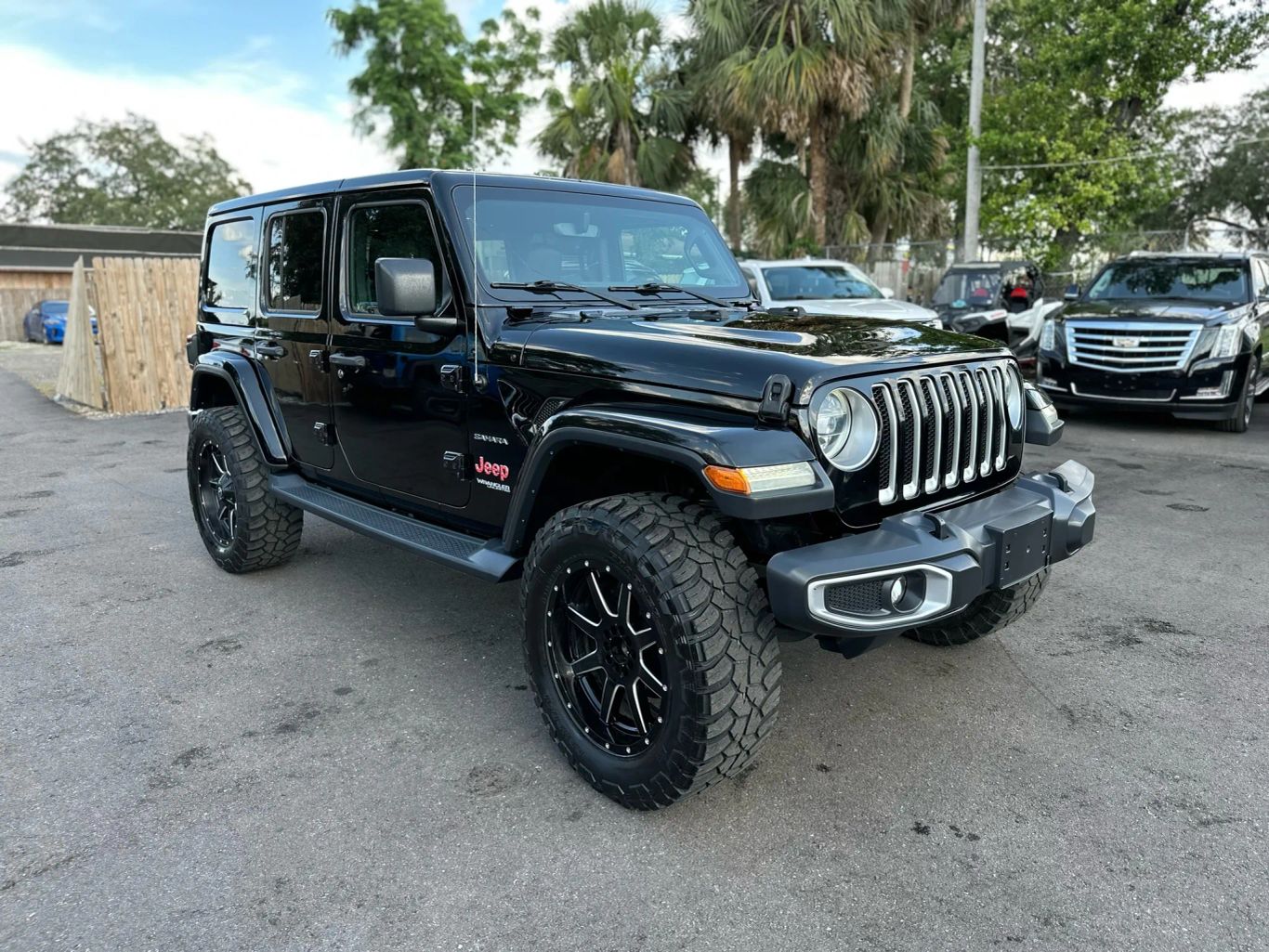 2018 JEEP WRANGLER UNLIMITED SUV 4-CYL, TURBO, 2.0 LITER ALL NEW SAHARA SPORT UTILITY 4D - Tampa Motor Cars