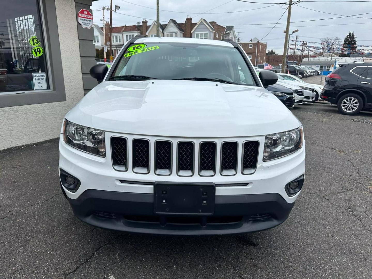 2016 Jeep Compass showcasing key features, including rugged design, advanced technology, and versatile interior for all-terrain driving.