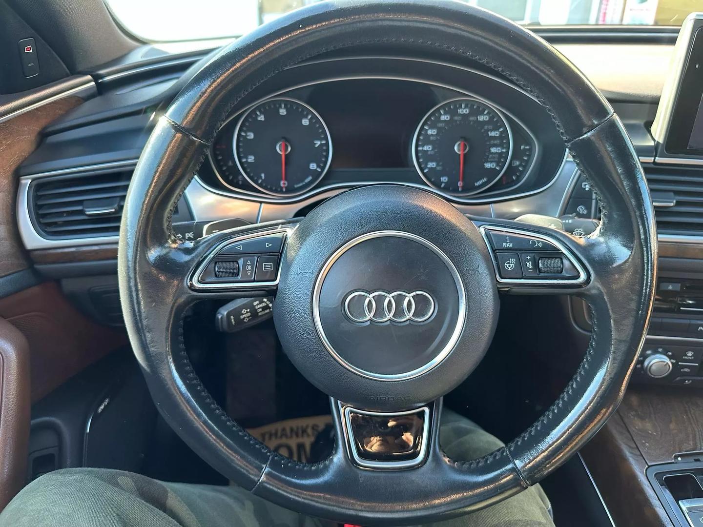 2015 Audi A6 in pristine condition, showcasing its sleek design and premium features.