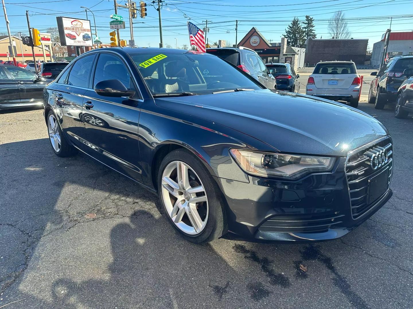 2015 Audi A6 in pristine condition, showcasing its sleek design and premium features.