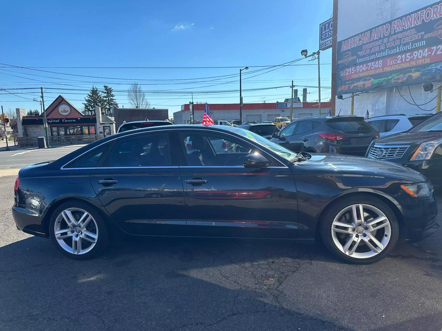 2015 Audi A6 in pristine condition, showcasing its sleek design and premium features.