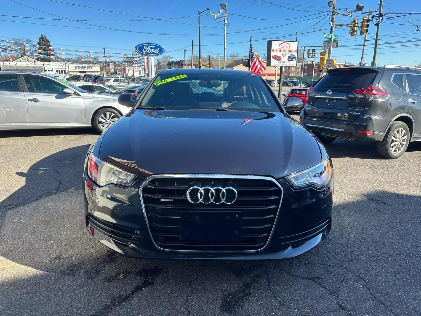 2015 Audi A6 in pristine condition, showcasing its sleek design and premium features.