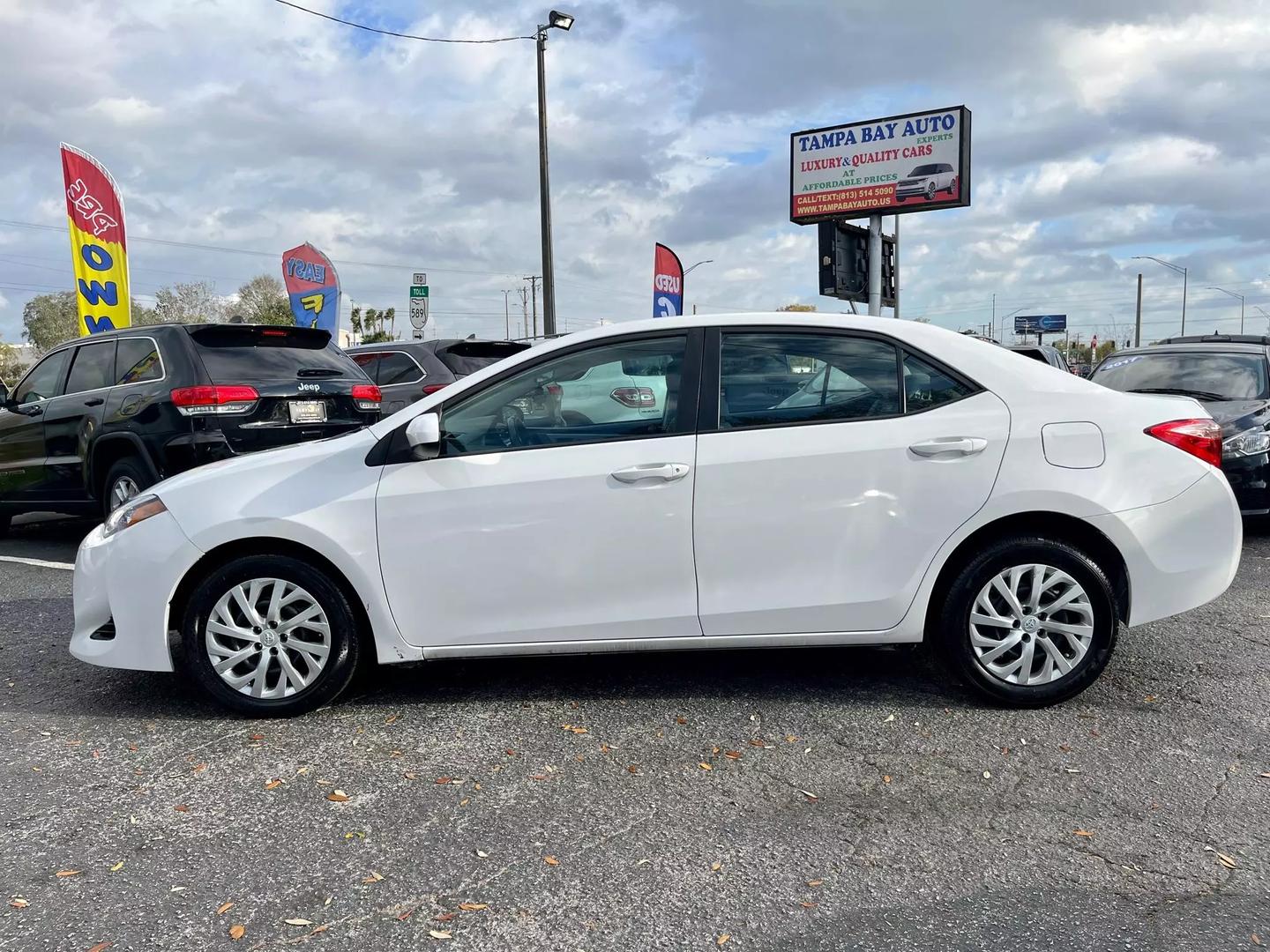 Used 2019 Toyota Corolla LE with VIN 5YFBURHE6KP904882 for sale in Tampa, FL