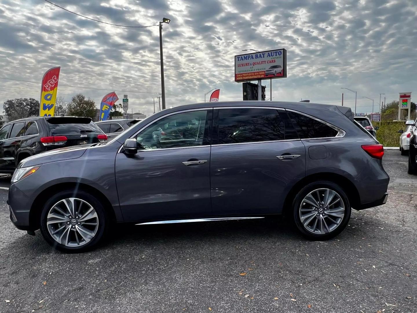 Used 2017 Acura MDX Technology Package with VIN 5J8YD4H59HL002274 for sale in Tampa, FL