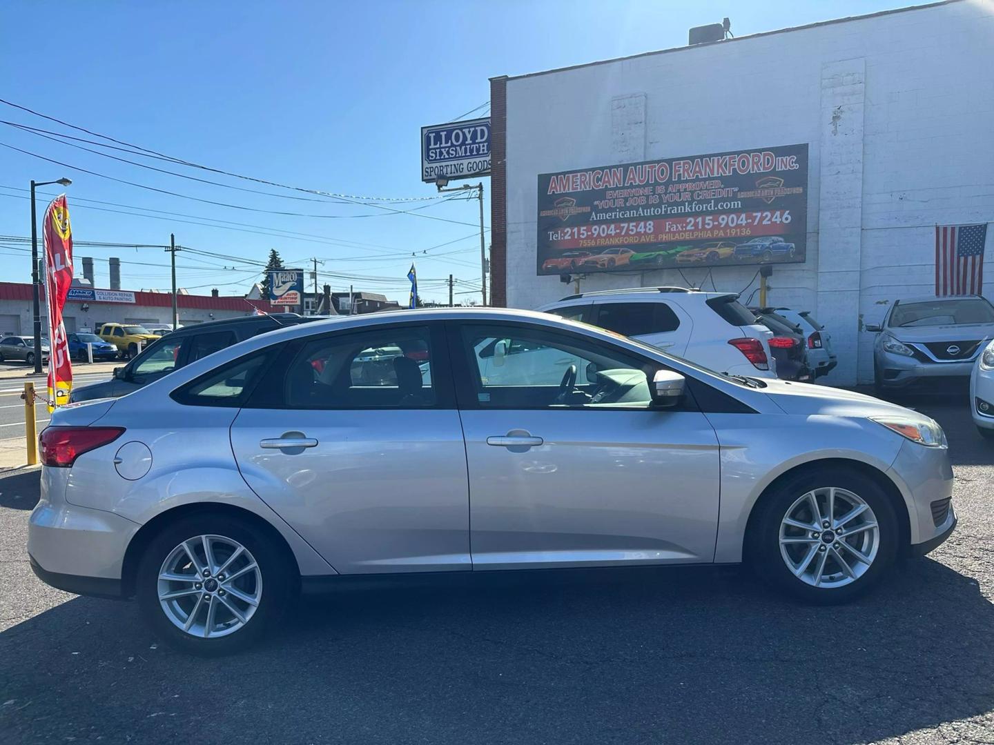 2015 Ford Focus parked outdoors, showcasing its sleek design and compact build.