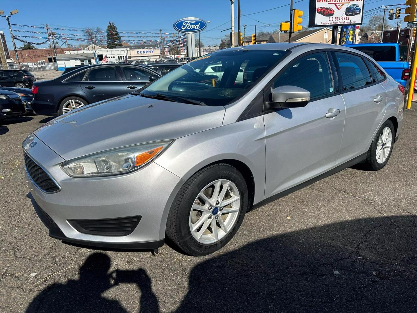 2015 Ford Focus parked outdoors, showcasing its sleek design and compact build.