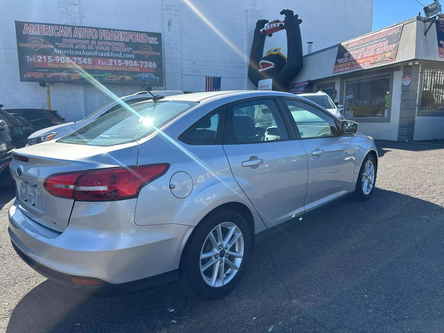 2015 Ford Focus parked outdoors, showcasing its sleek design and compact build.