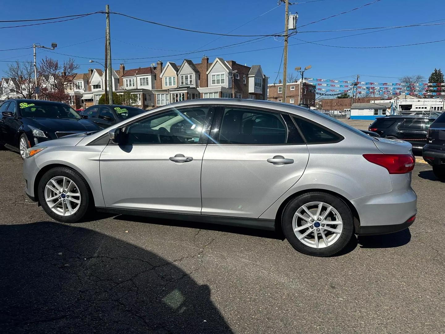 2015 Ford Focus parked outdoors, showcasing its sleek design and compact build.