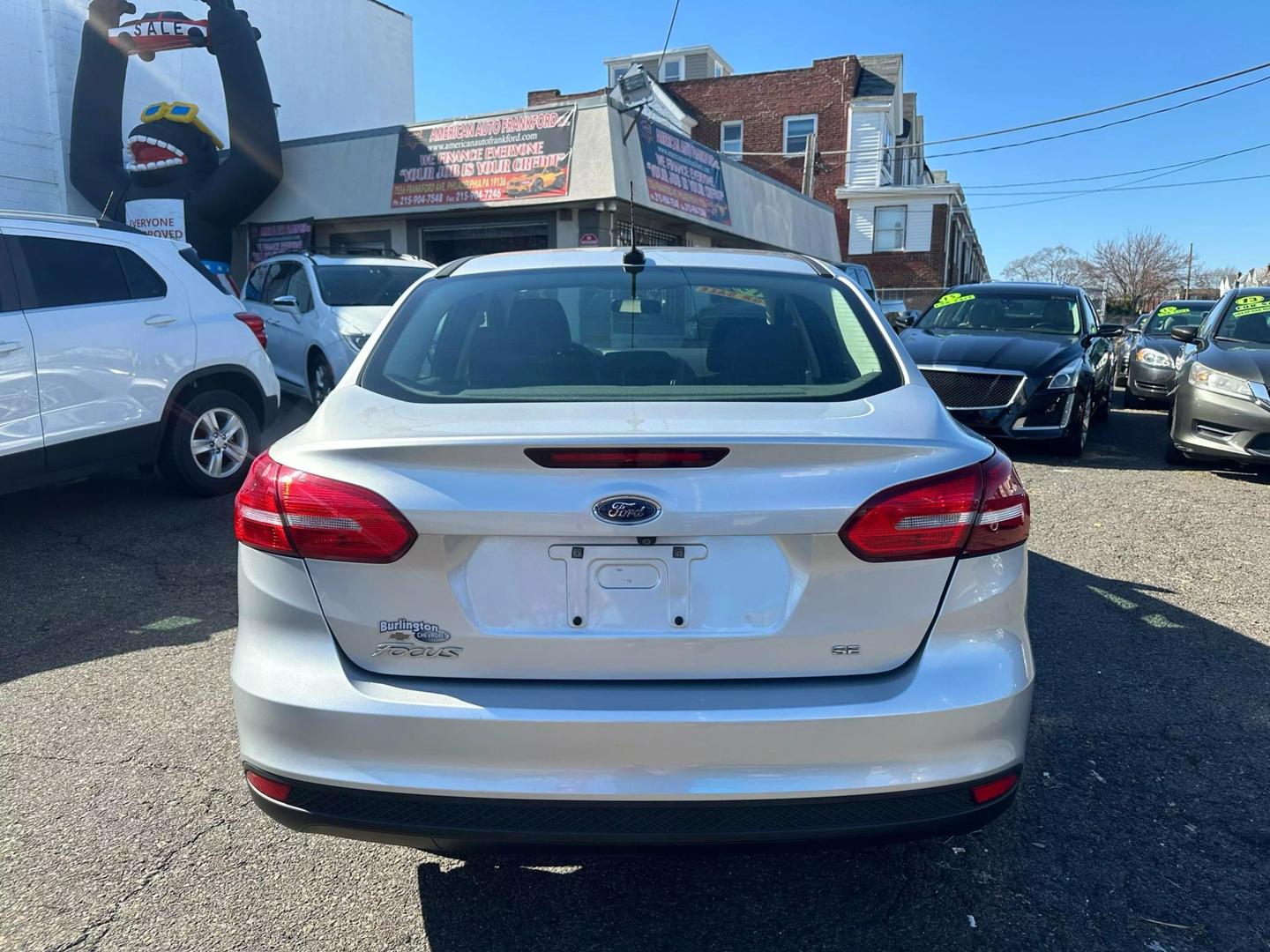 2015 Ford Focus parked outdoors, showcasing its sleek design and compact build.