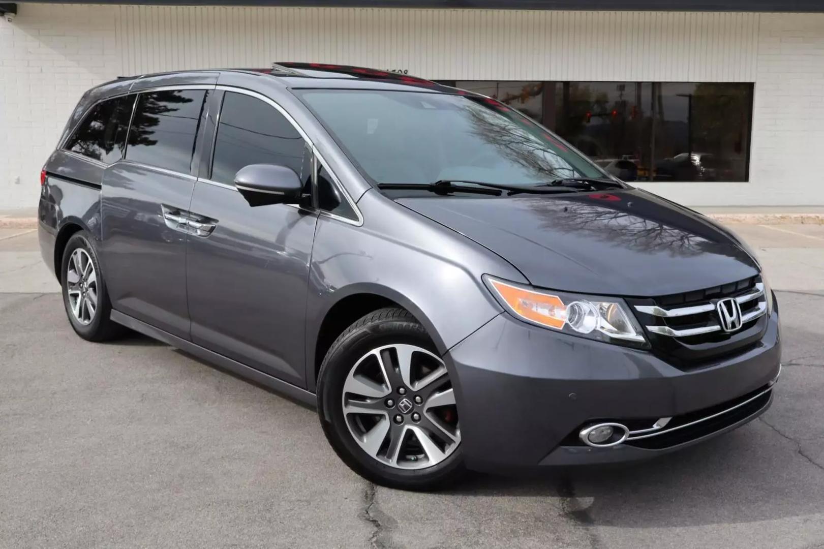Used 2014 Honda Odyssey Touring with VIN 5FNRL5H97EB065208 for sale in West Jordan, UT