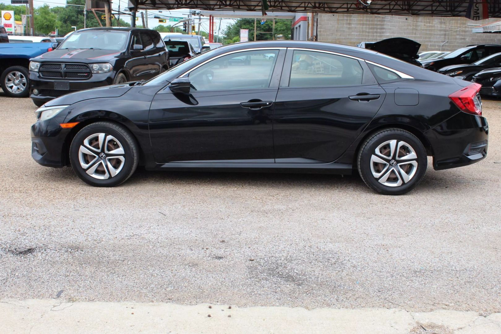 Used 2016 Honda Civic LX with VIN 19XFC2F58GE058309 for sale in Dallas, TX