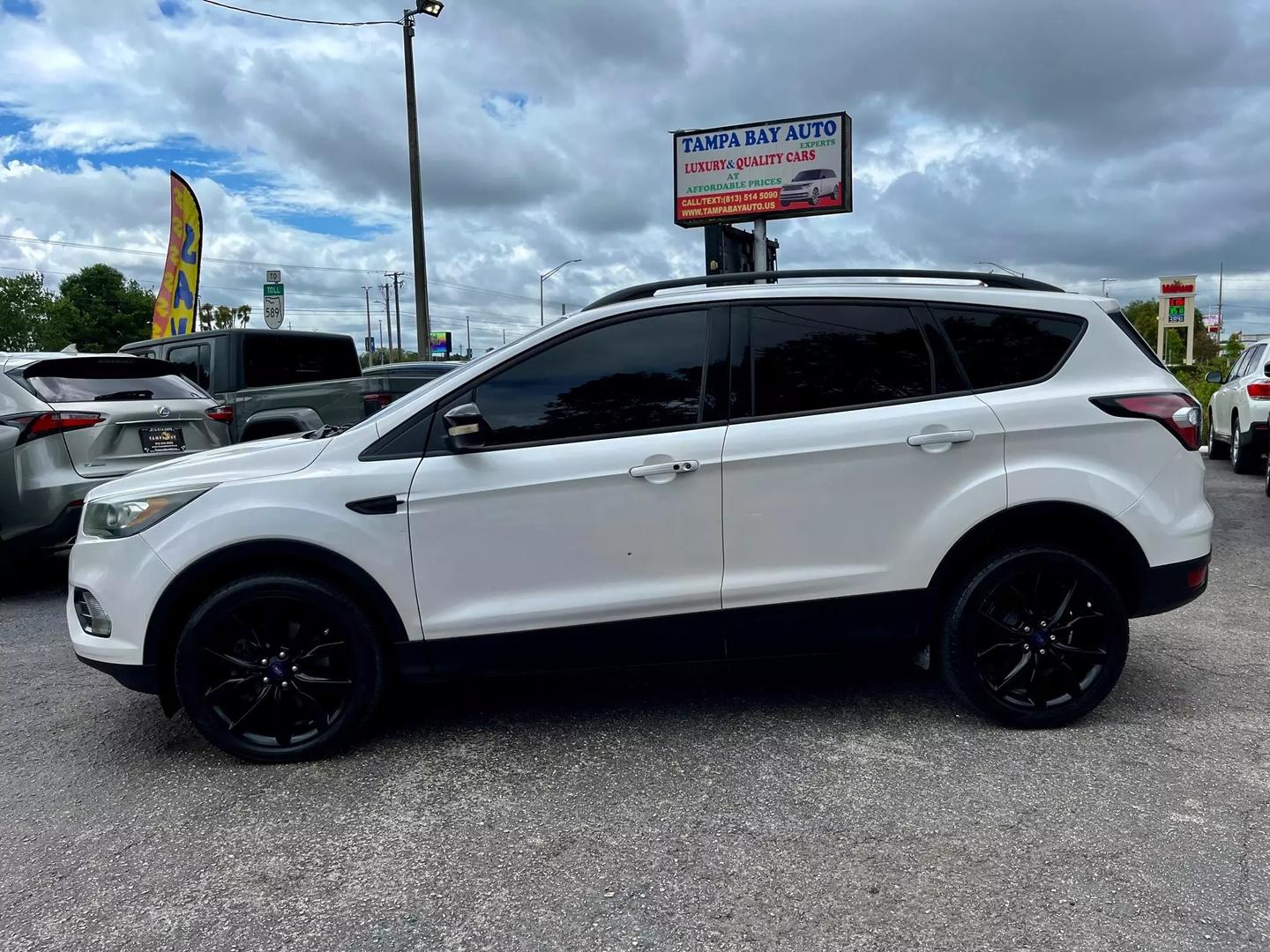 Used 2017 Ford Escape Titanium with VIN 1FMCU9J9XHUA03510 for sale in Tampa, FL
