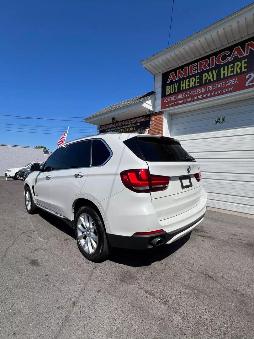 Front view of the 2015 BMW X5 luxury SUV showcasing sleek design and powerful build.