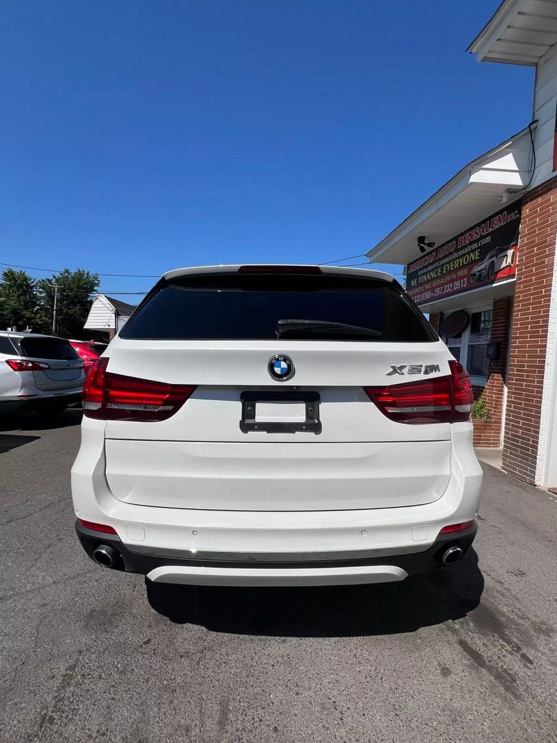 Front view of the 2015 BMW X5 luxury SUV showcasing sleek design and powerful build.