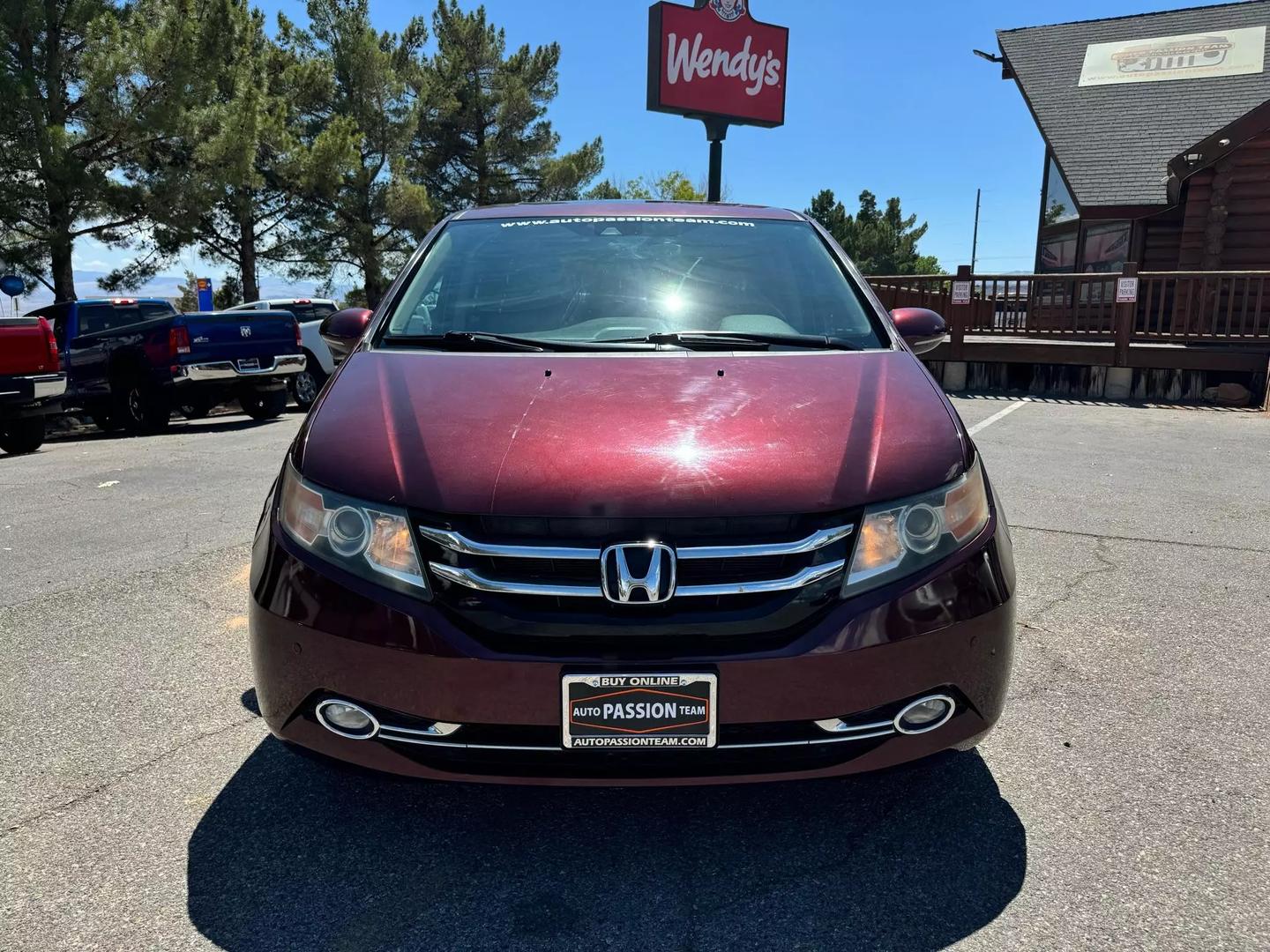Used 2016 Honda Odyssey Touring with VIN 5FNRL5H94GB141745 for sale in St. George, UT
