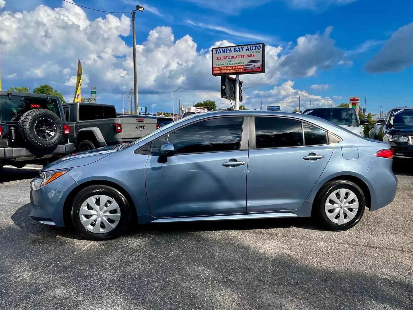 Used 2022 Toyota Corolla L with VIN 5YFDPMAE0NP291482 for sale in Tampa, FL