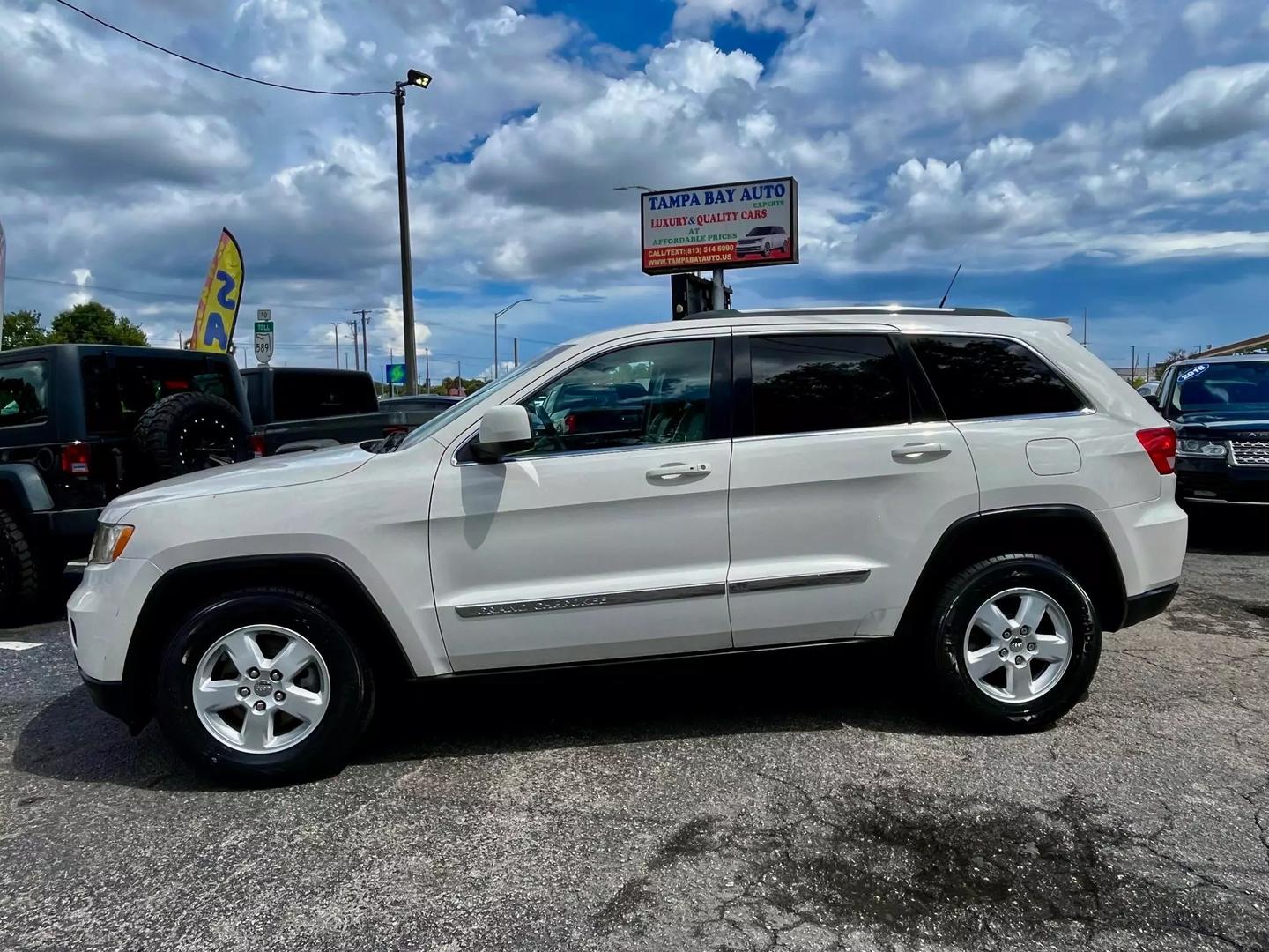 Used 2011 Jeep Grand Cherokee Laredo with VIN 1J4RS4GGXBC515790 for sale in Tampa, FL