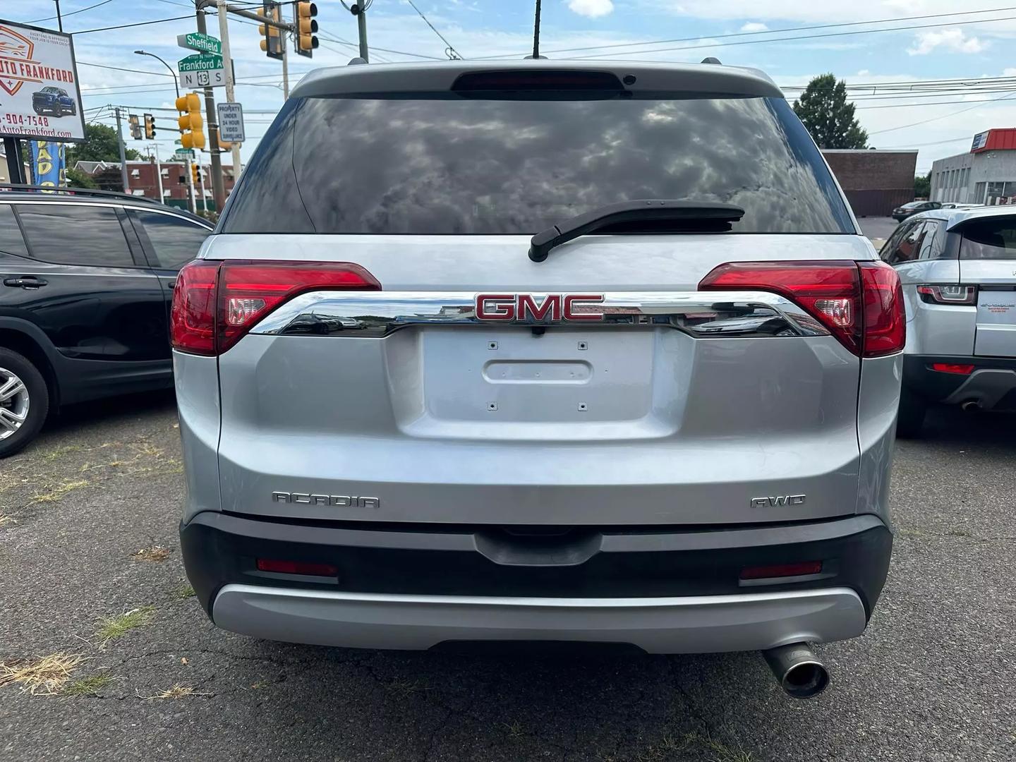 2017 GMC Acadia SUV showcasing its sleek design and modern features, perfect for family adventures and everyday driving.