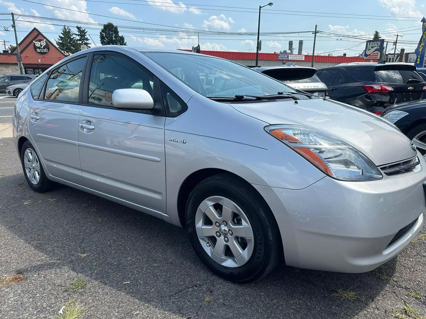 2009 Toyota Prius hybrid car with sleek design, known for its fuel efficiency and eco-friendly performance.