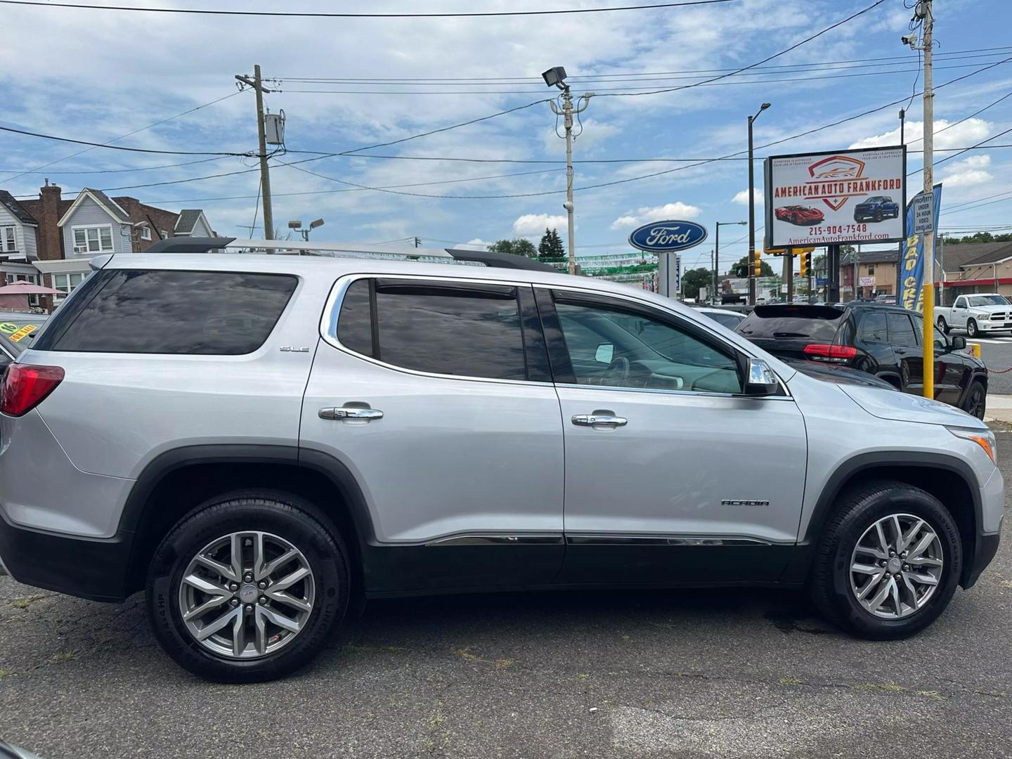 2017 GMC Acadia SUV showcasing its sleek design and modern features, perfect for family adventures and everyday driving.