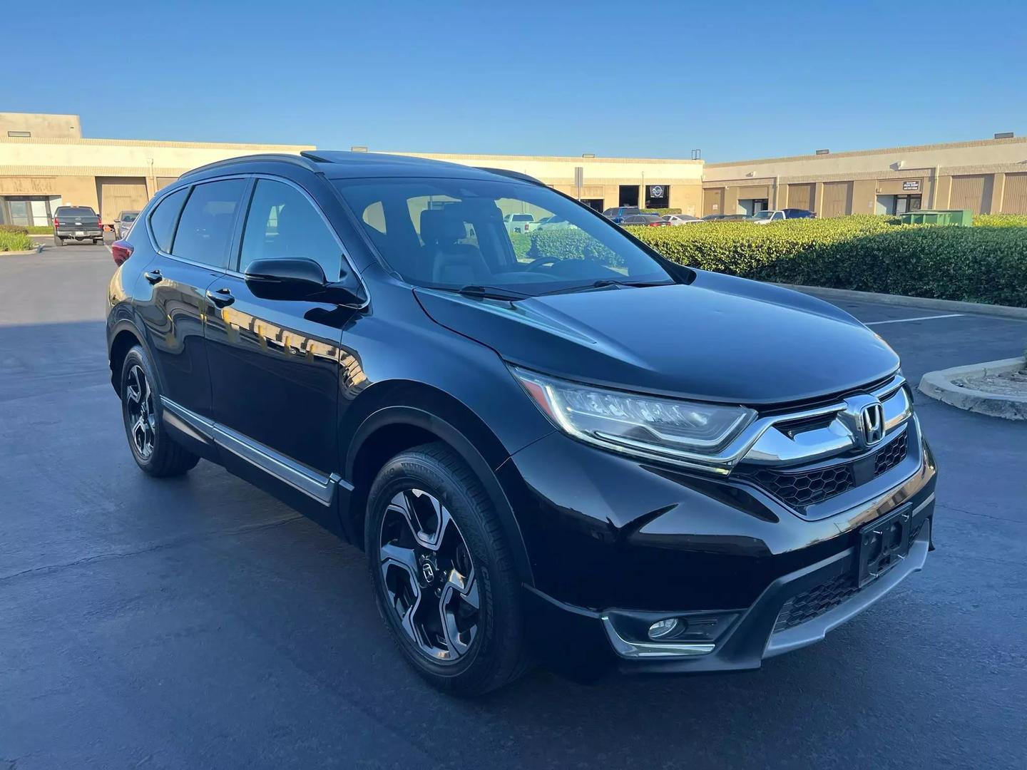 Used 2017 Honda CR-V Touring with VIN 7FARW1H93HE026012 for sale in Pomona, CA