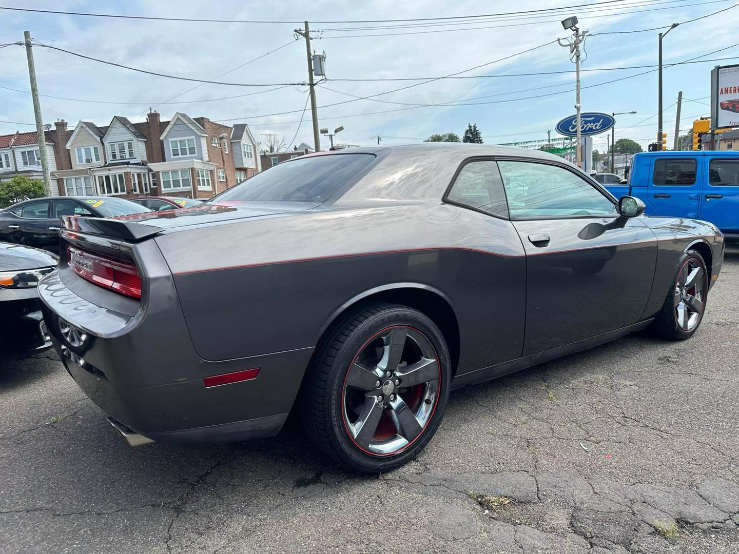 2014 Dodge Challenger with a bold design and sleek exterior, showcasing its powerful and dynamic presence.