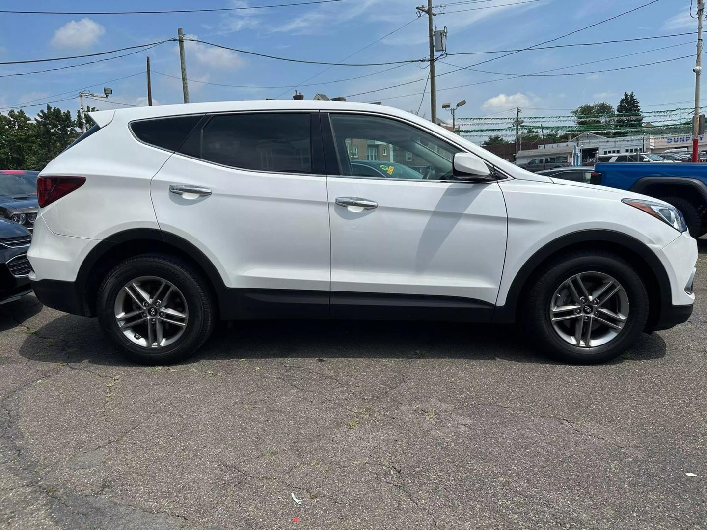 Features of the 2017 Hyundai Santa Fe Sport, showcasing its spacious interior, modern technology, and stylish exterior design.