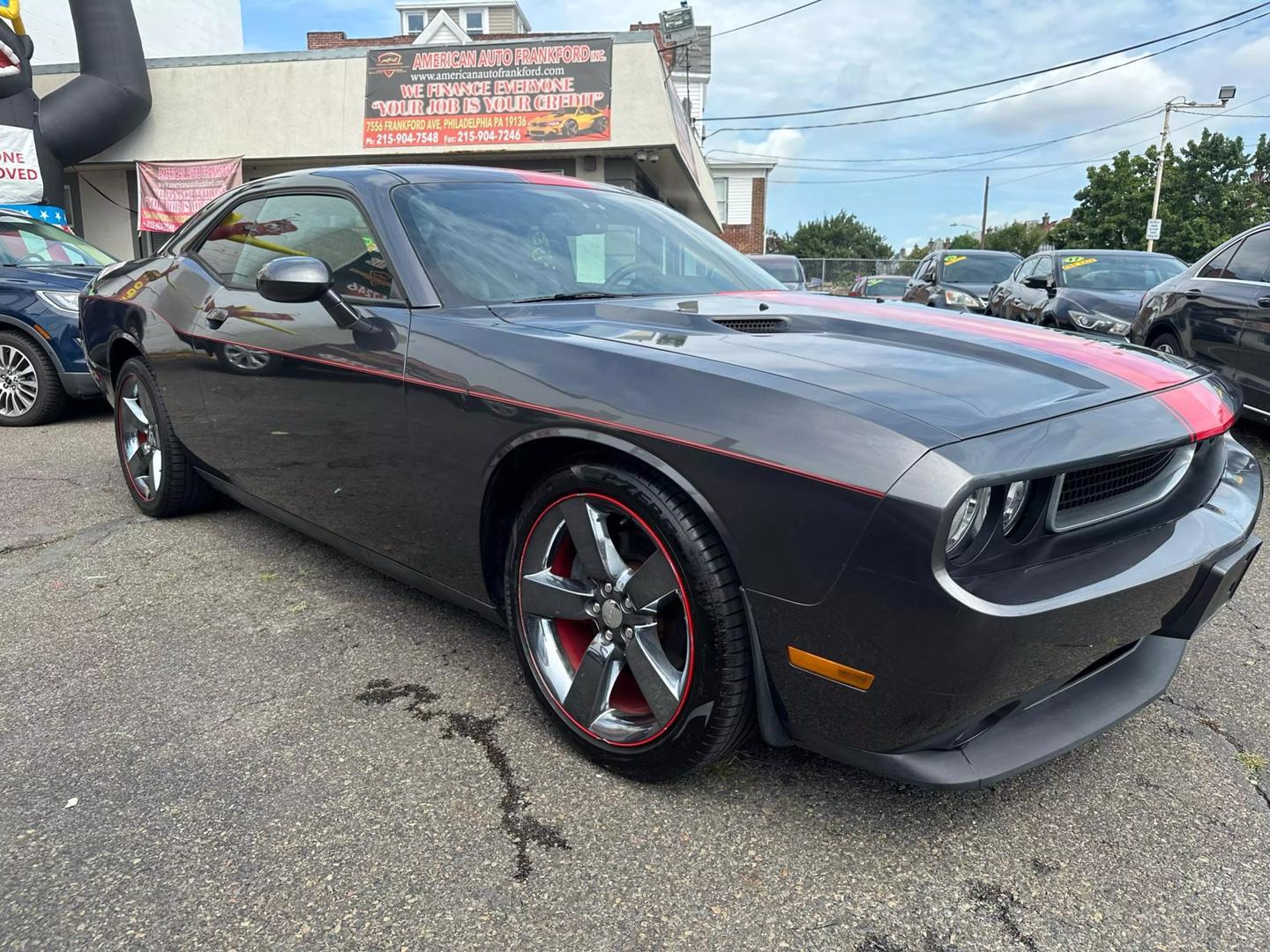 2014 Dodge Challenger with a bold design and sleek exterior, showcasing its powerful and dynamic presence.