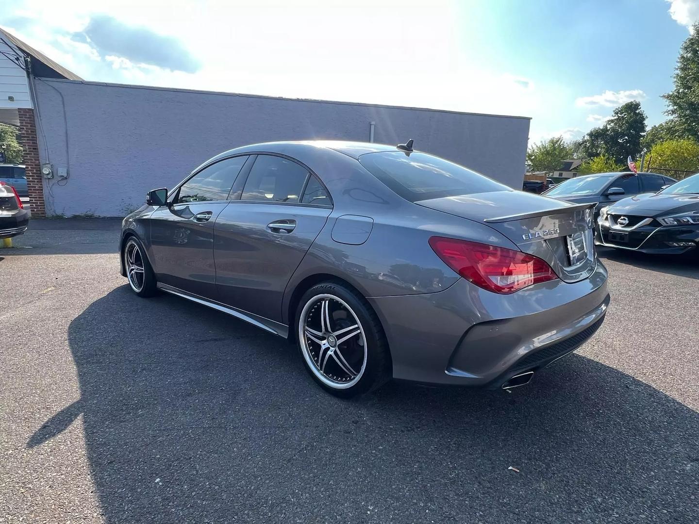 A 2016 Mercedes-Benz CLA showcasing its elegant design and sleek curves, emphasizing luxury and modern appeal.