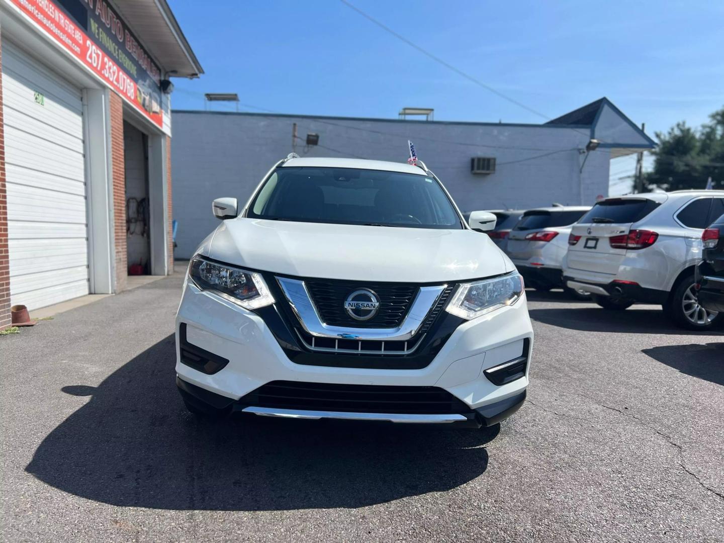 2019 Nissan Rogue SUV showcasing its sleek design and spacious interior, perfect for family and adventure.