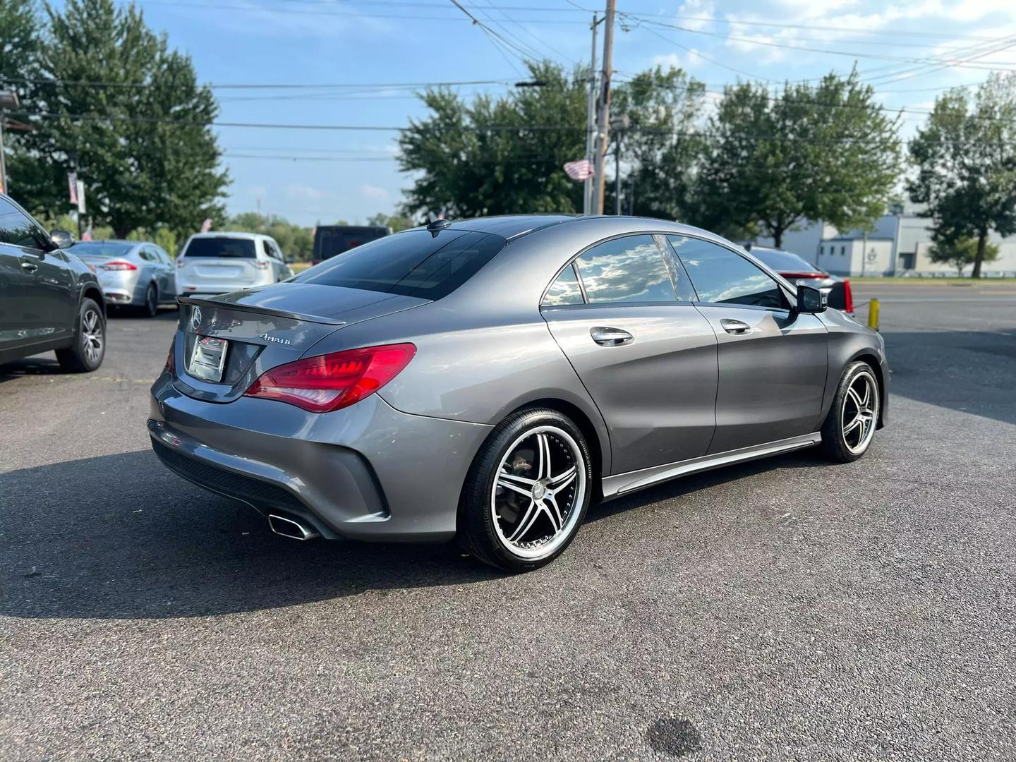 A 2016 Mercedes-Benz CLA showcasing its elegant design and sleek curves, emphasizing luxury and modern appeal.