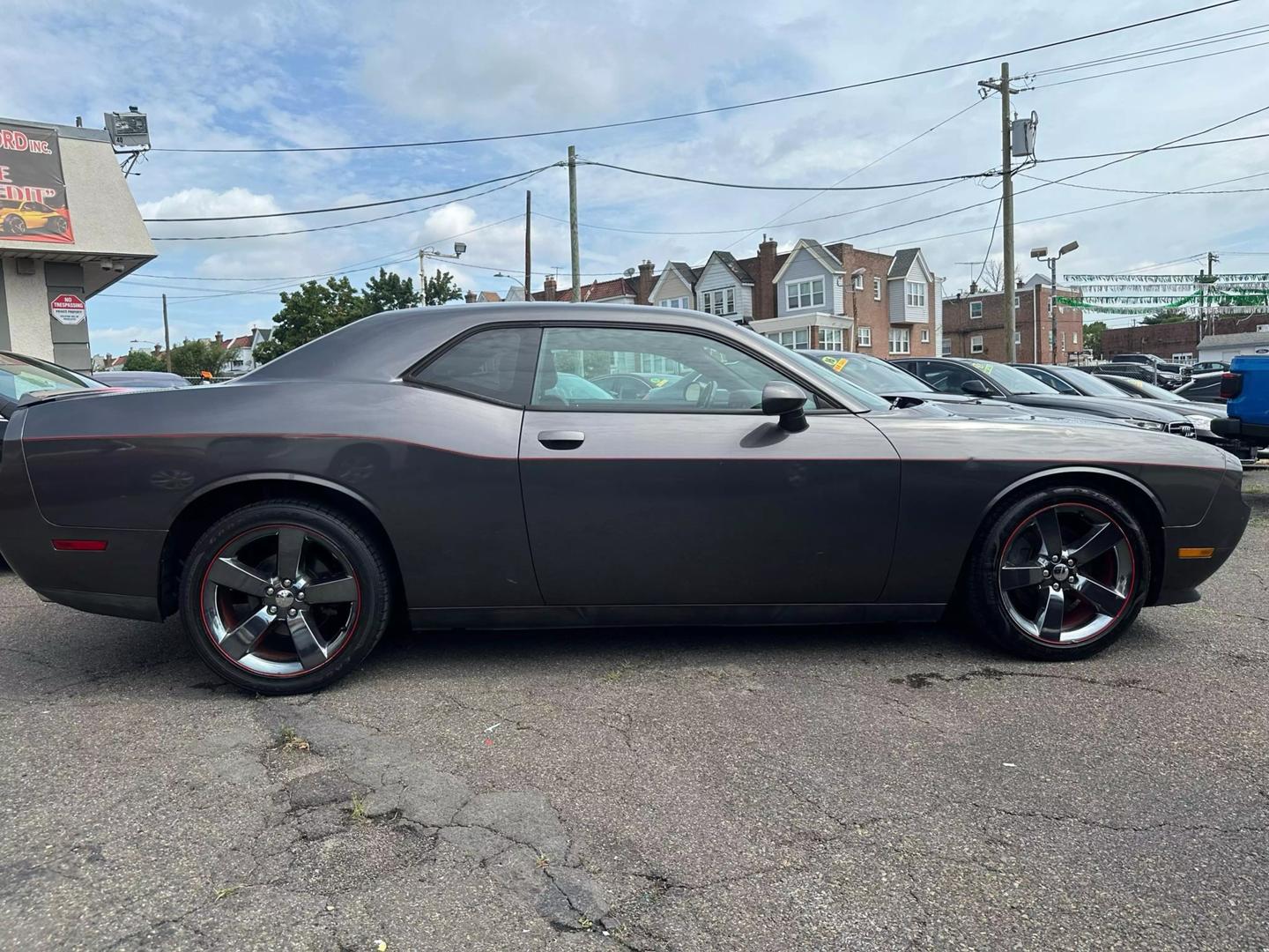 2014 Dodge Challenger with a bold design and sleek exterior, showcasing its powerful and dynamic presence.